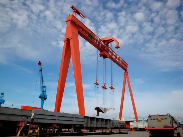Large orange gantry crane at dock